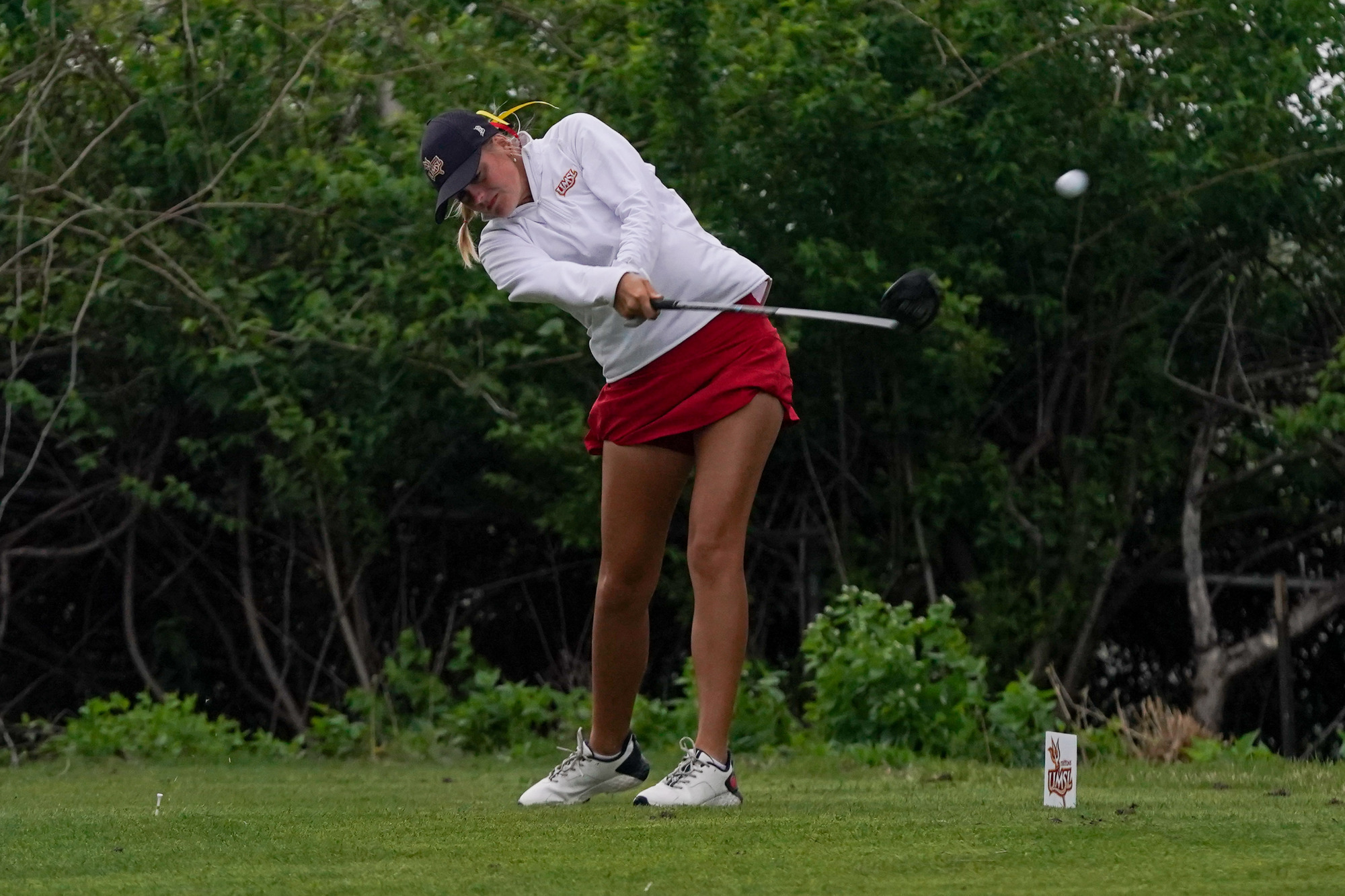Hillary Currier tees off on a hole during the second round of the UMSL Spring Invitational on Sunday (April 12) at Norwood Hills Country Club