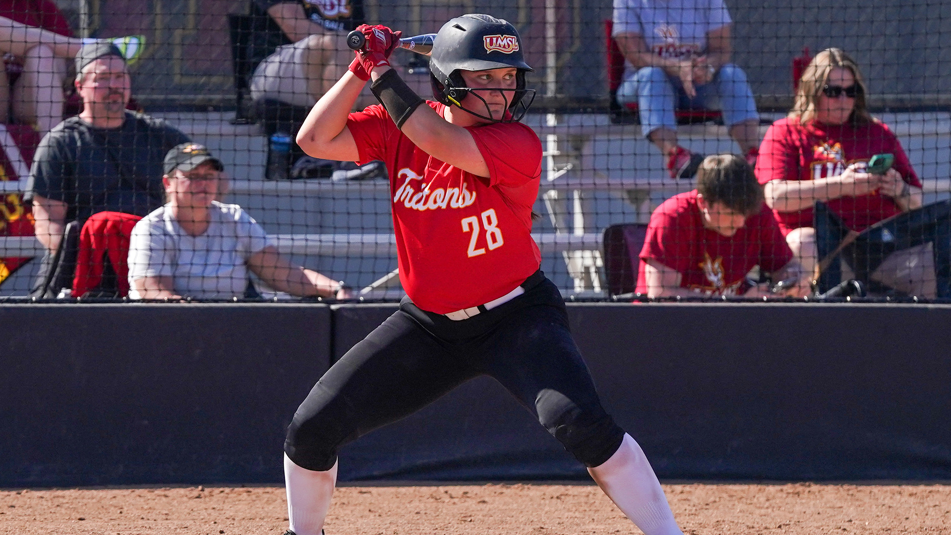 Phoebe Miller stands at the plate waiting for a pitch to be delivered to the plate