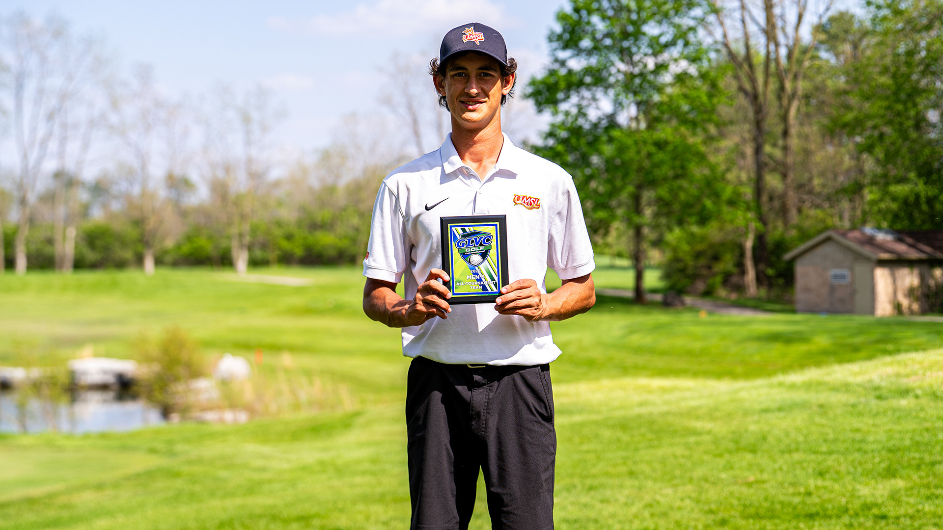Trigg Lindahl holds his Great Lakes Valley Conference All-GLVC Plaque after finishing second in the stroke play portion at the GLVC Men's Golf Championship tournament