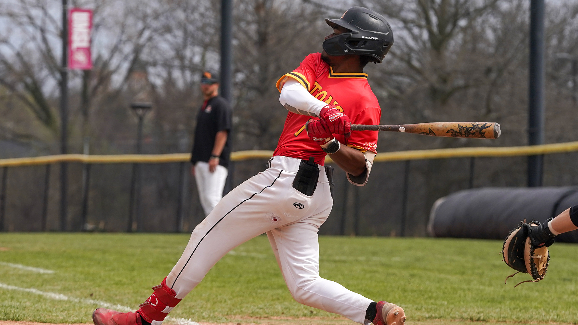LJ Randle follows through on his swing after hitting a baseball in a game against Southwest Baptist