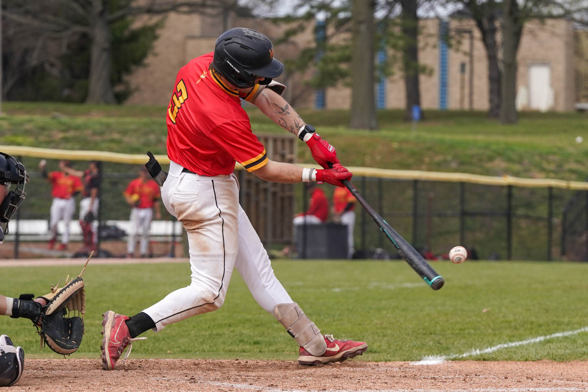 Mitch Bonczkowski hits a baseball to the left side of the diamond