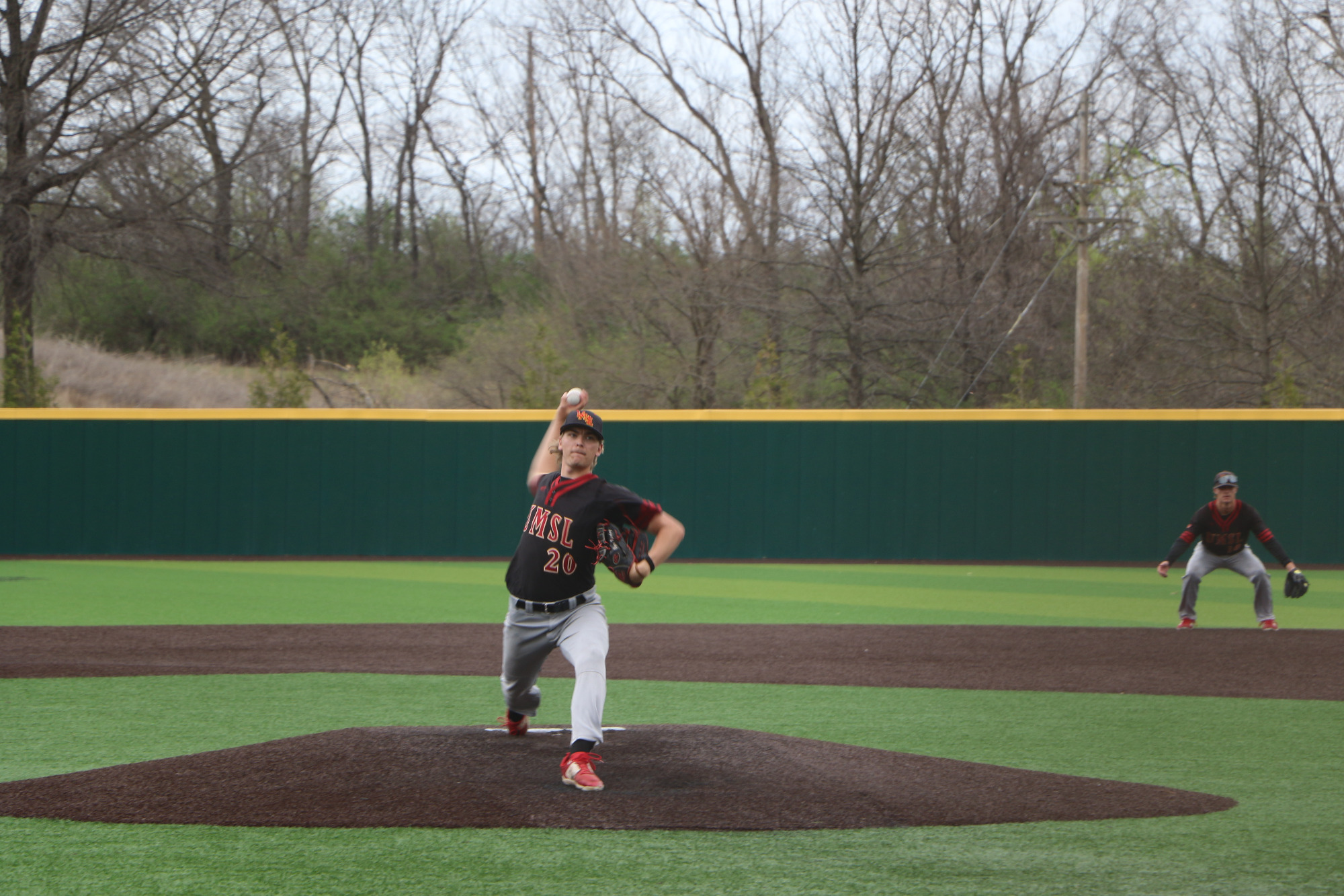 Bryce Nicolay delivers a pitch to the plate in a game against William Jewell