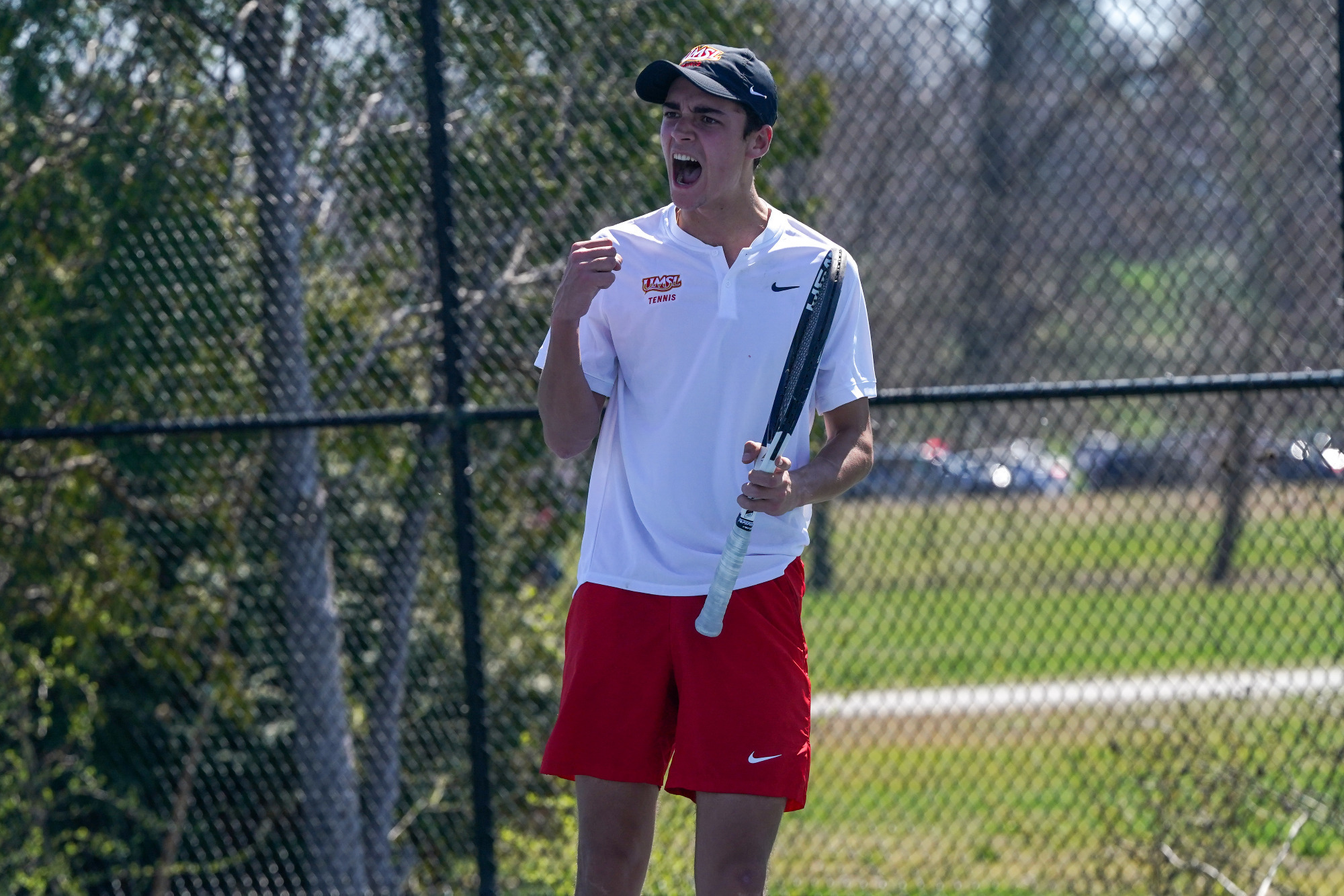 Henry Roberts celebrates after scoring a point in a match against Northwest Missouri State