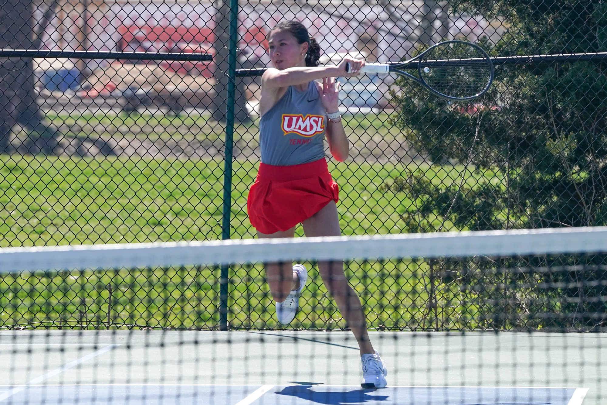Hannah Tse follows through after hitting a forehand shot