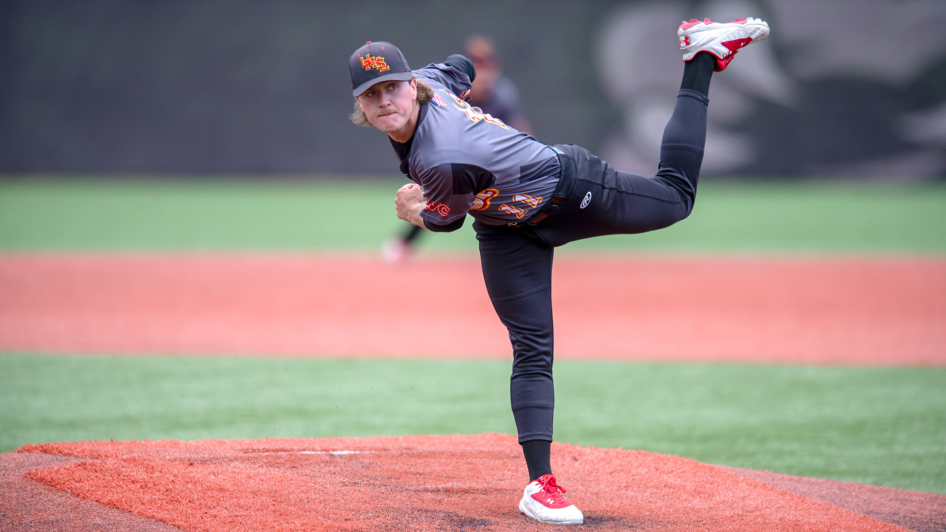 Garrett Brunstetter follows through on a pitch to the plate