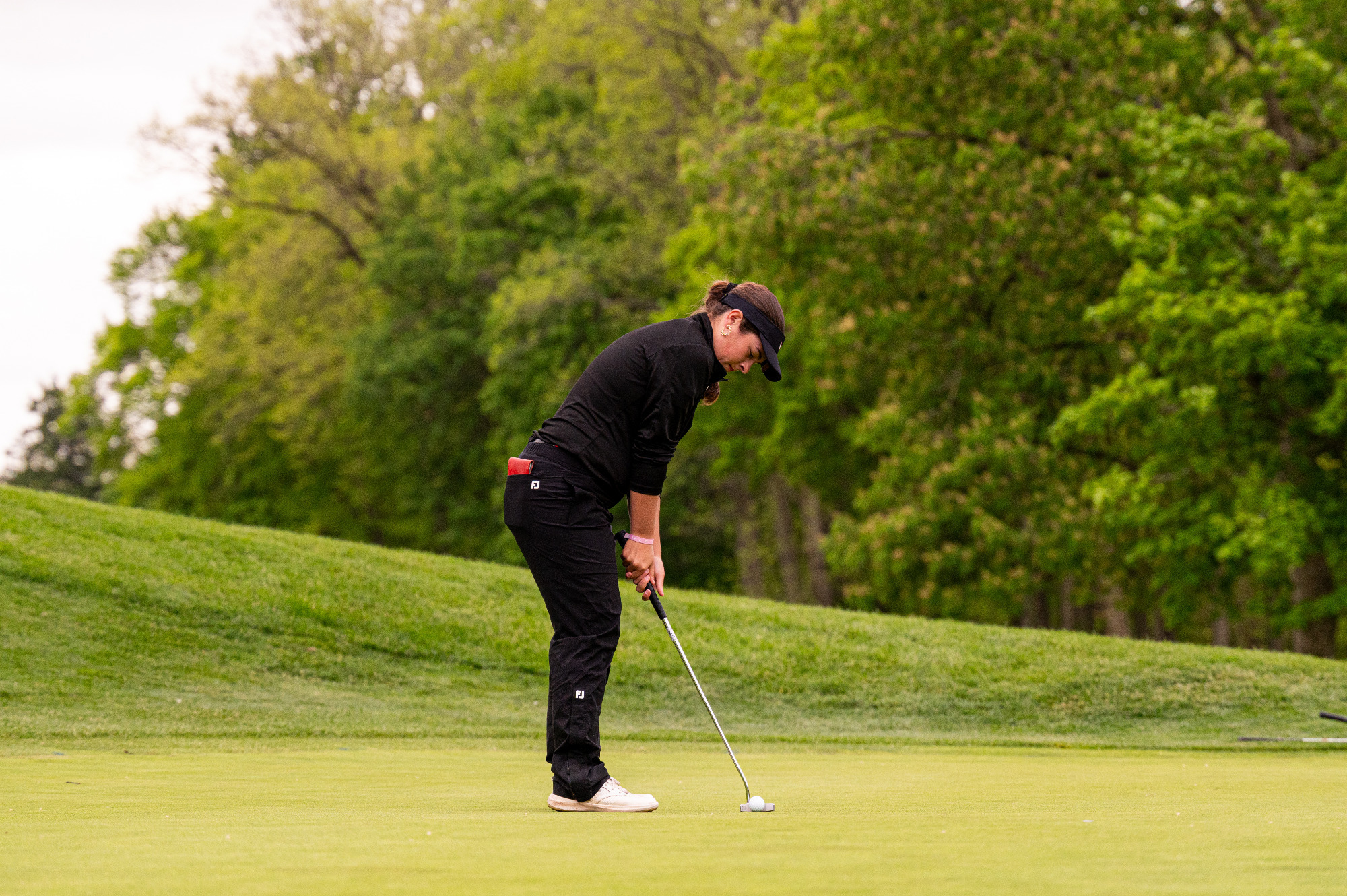 Alaina Ervin attempts a putt at the NCAA East Regional