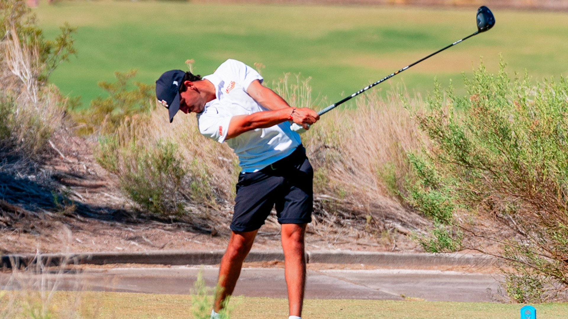 Dani Solavera hits a driver off the tee during his match in the medal/match play quarterfinal at the NCAA Championships