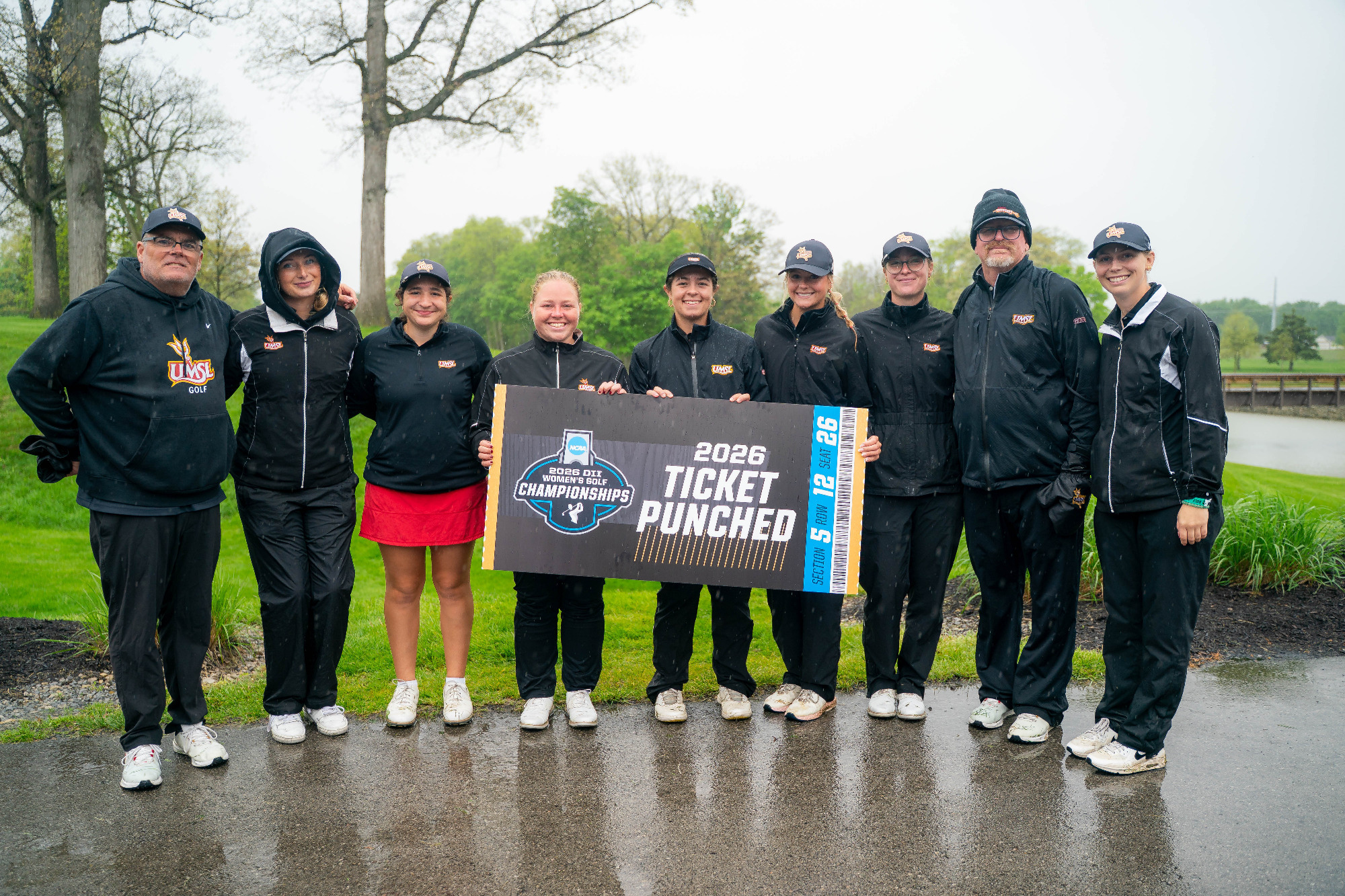 UMSL's women's golf punched its ticket to the 2026 NCAA DII Championships with a fourth place finish at the East Regional. Players and Coaches pose with the ticket punched sign. L-R: Head Coach Troy Halterman, Hope Williams, Mayan Covarrubias, Wilma Zanderau, Alaina Ervin, Hillary Currier, Emmy Wahl, Assistant Coach Scott Worley and Assistant Coach Kiley Cline
