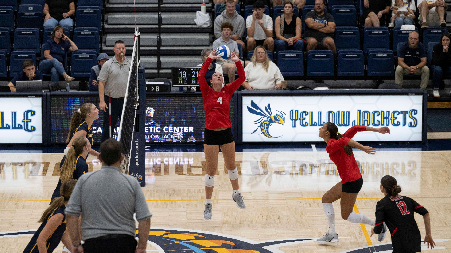 Marly Burbach sets a ball for an attack during a match against Cedarville
