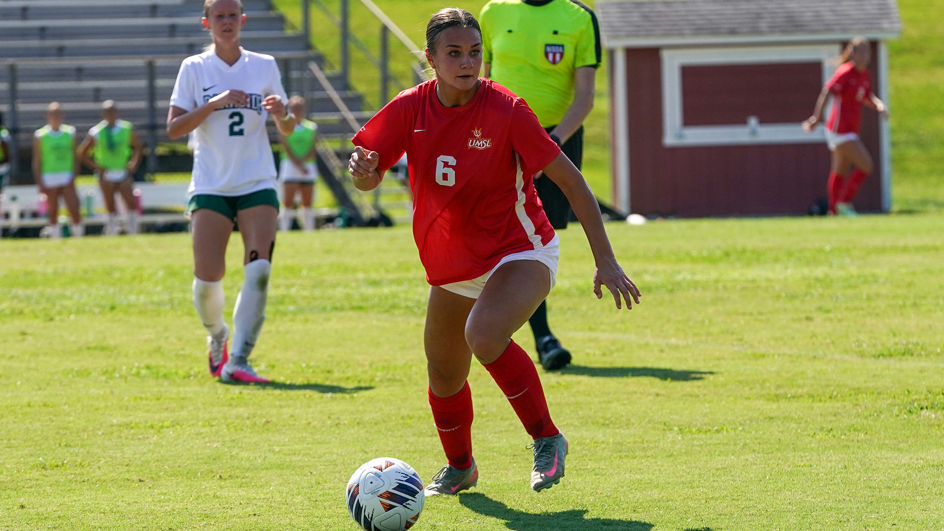 Madi Riege looks to make a pass in a game against Parkside