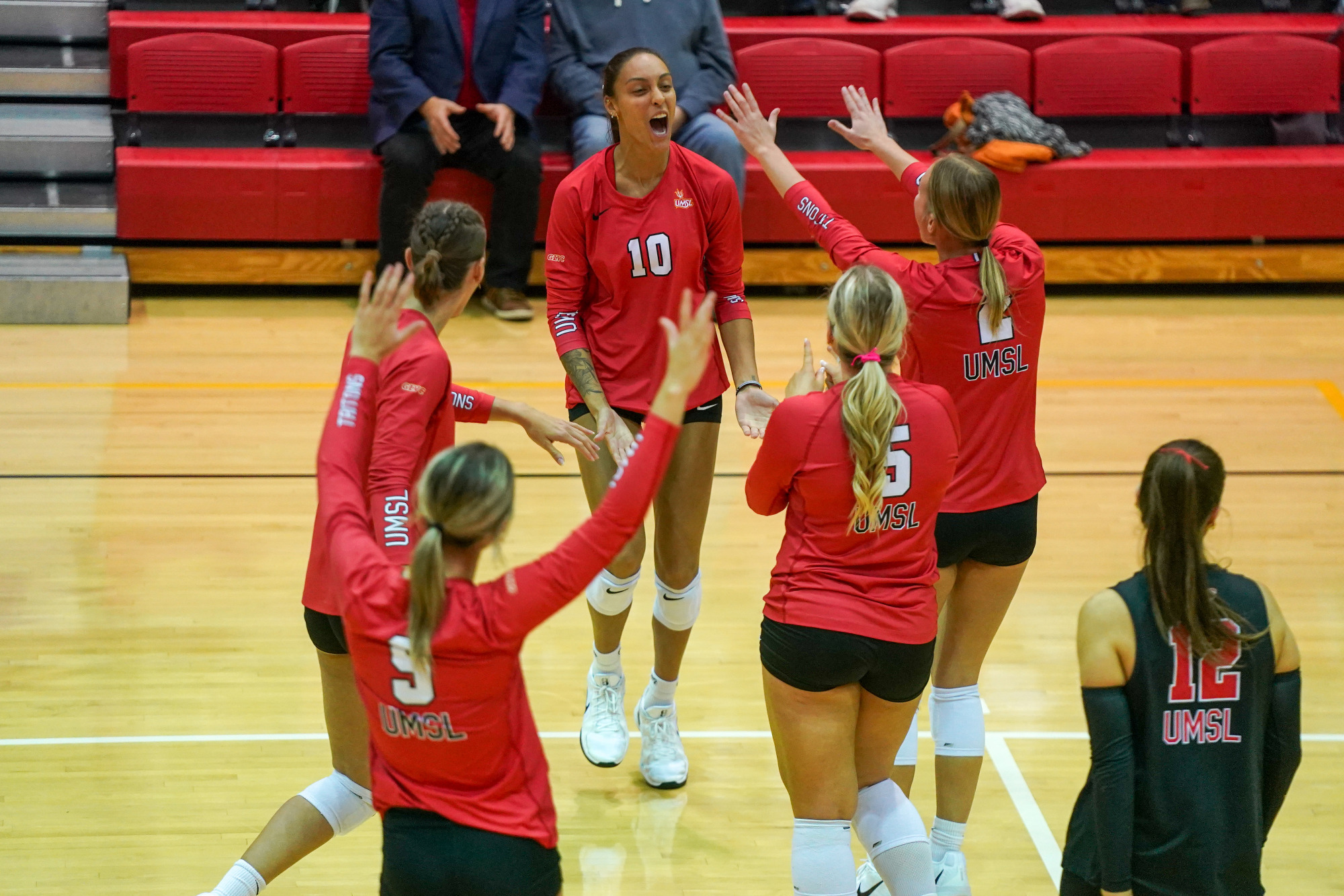  Brooklyn Young (#10) celebrates with teammates after recording a kill in an NCAA Volleyball match against McKendree