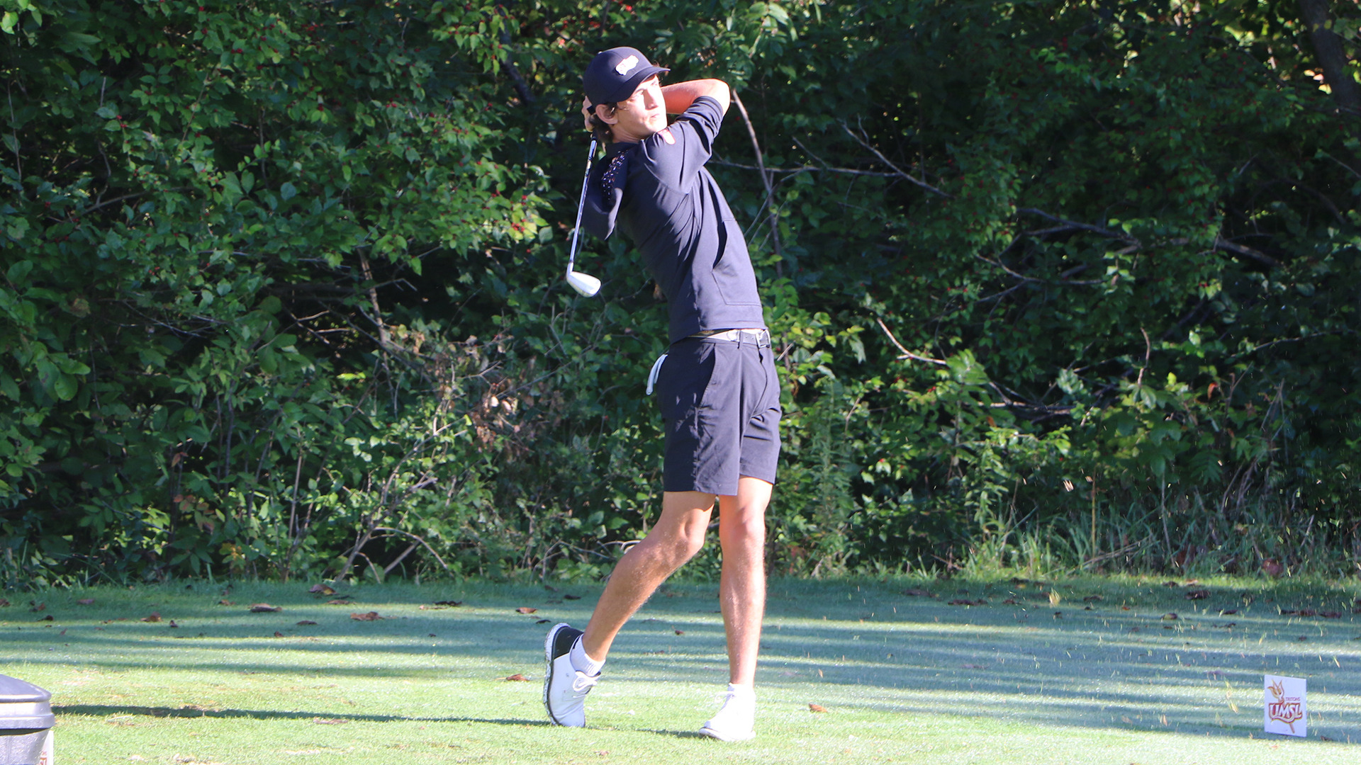Trigg Lindahl hits his tee shot on the fourth hole at Rock Hollow Golf Club