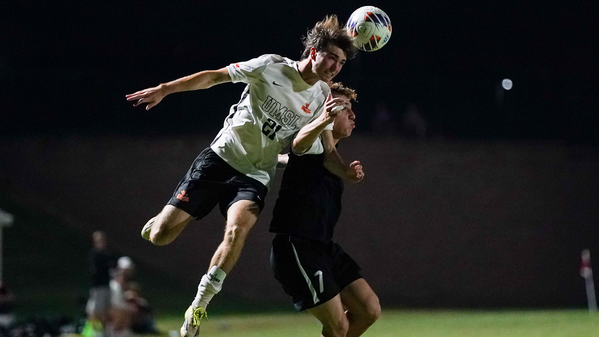 Mason Niedbalski (#21) battles Quincy's Lucca Barbero for a loose ball in an NCAA Division II Soccer Contest