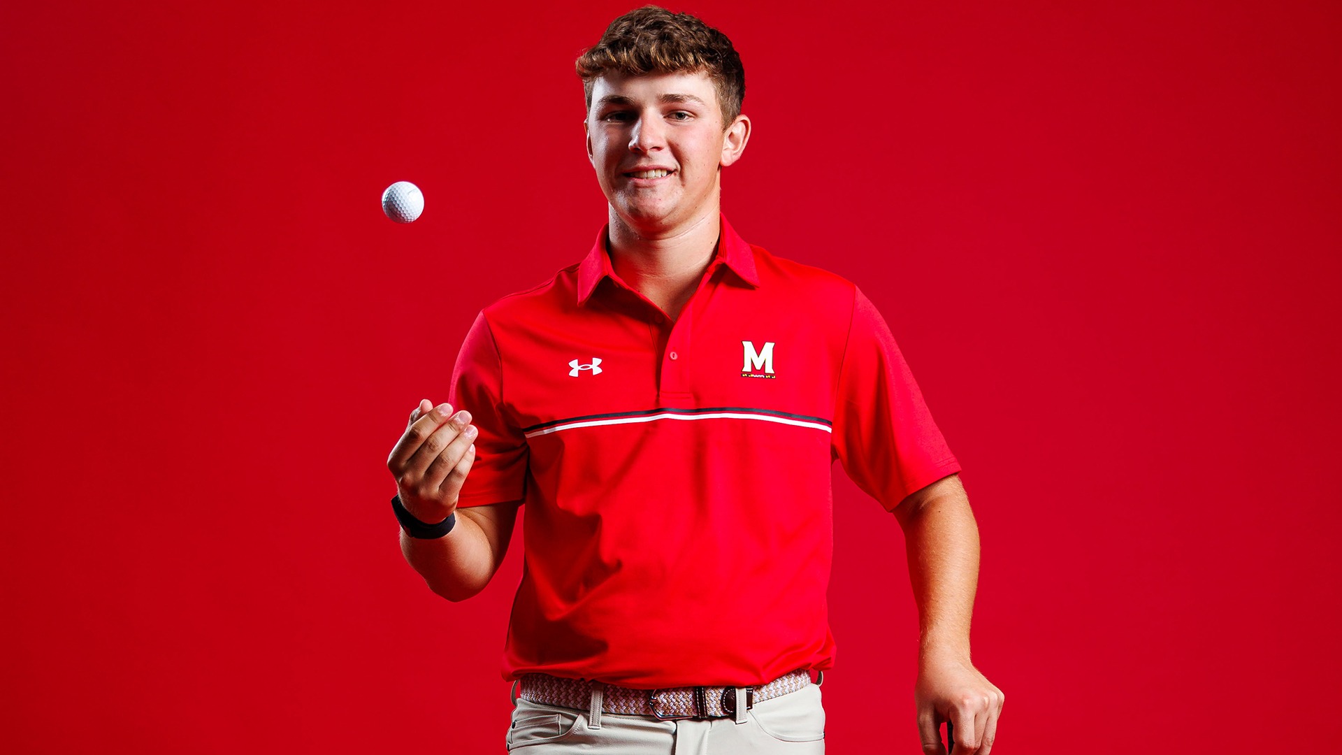 Griffin Barke posed red background 