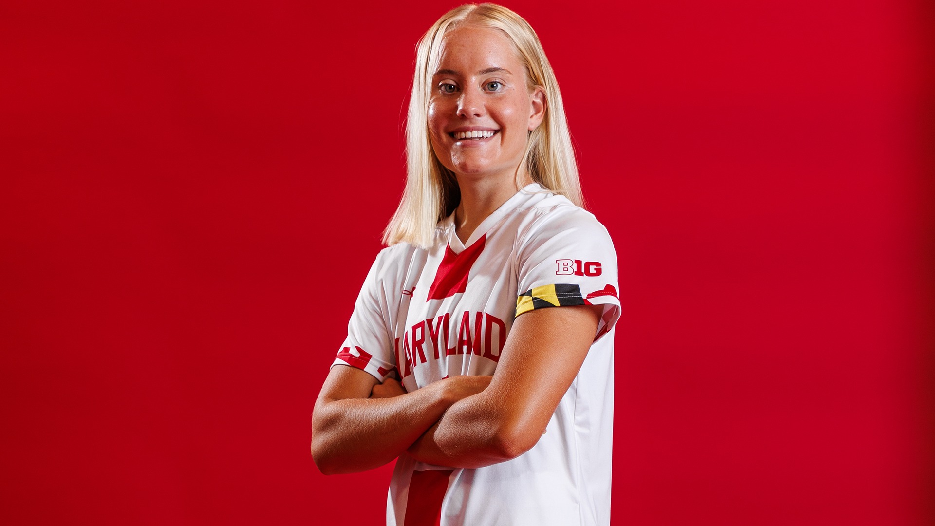 Kate Hawley Posed Red Background