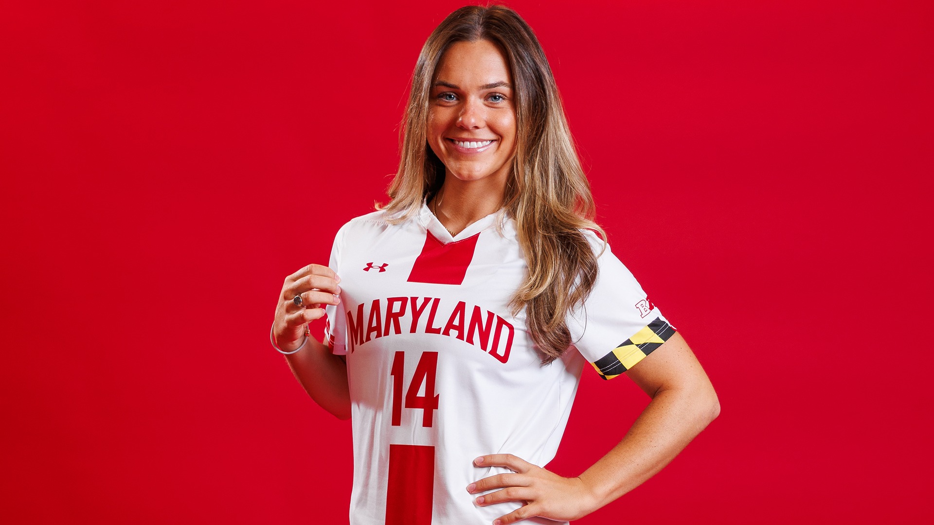 Kelsey Smith Posed Red Background