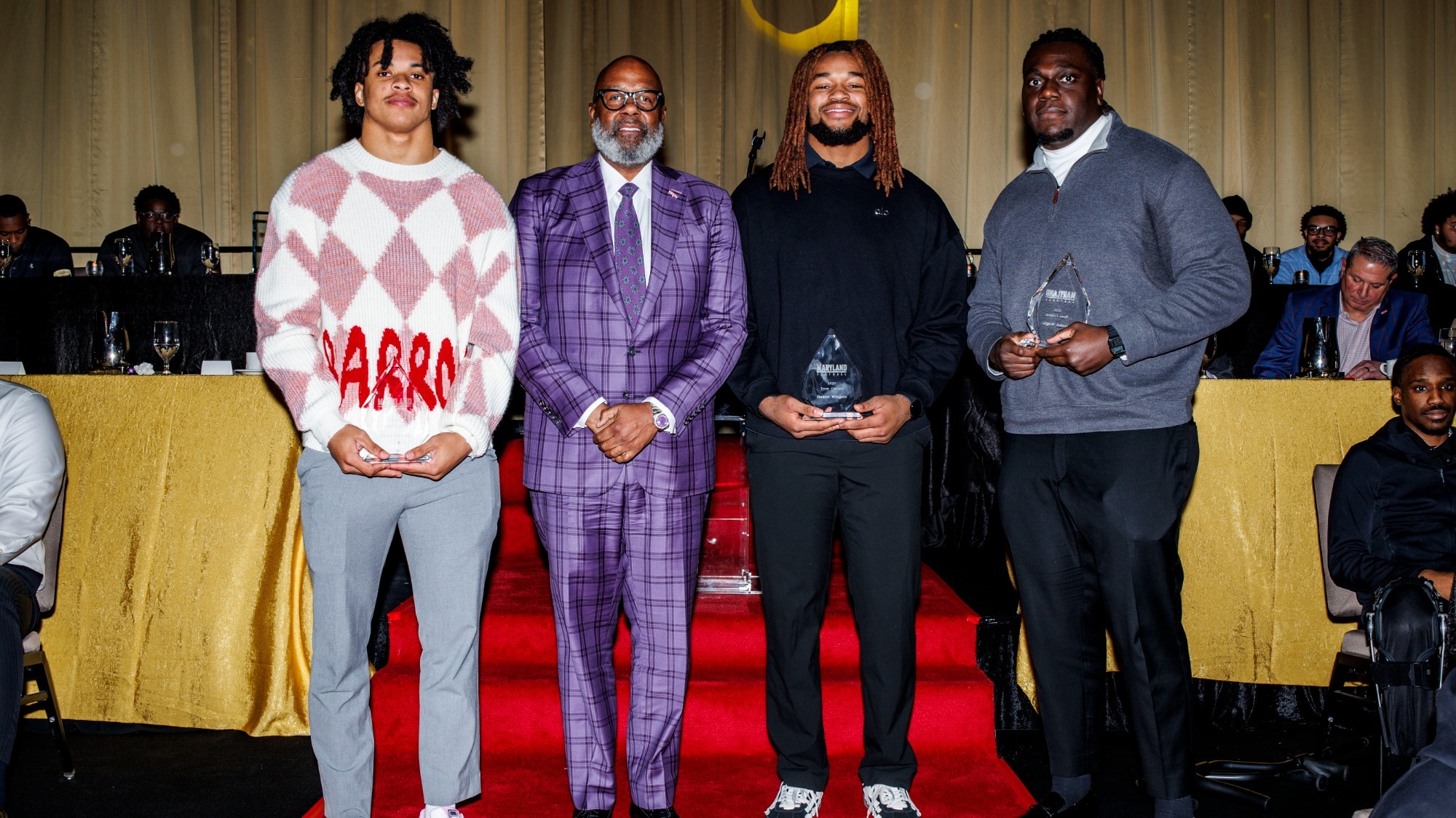 2025 Football Awards Banquet - Team MVPs Huskey, Wingate, Wright pictured with HC Mike Locksley