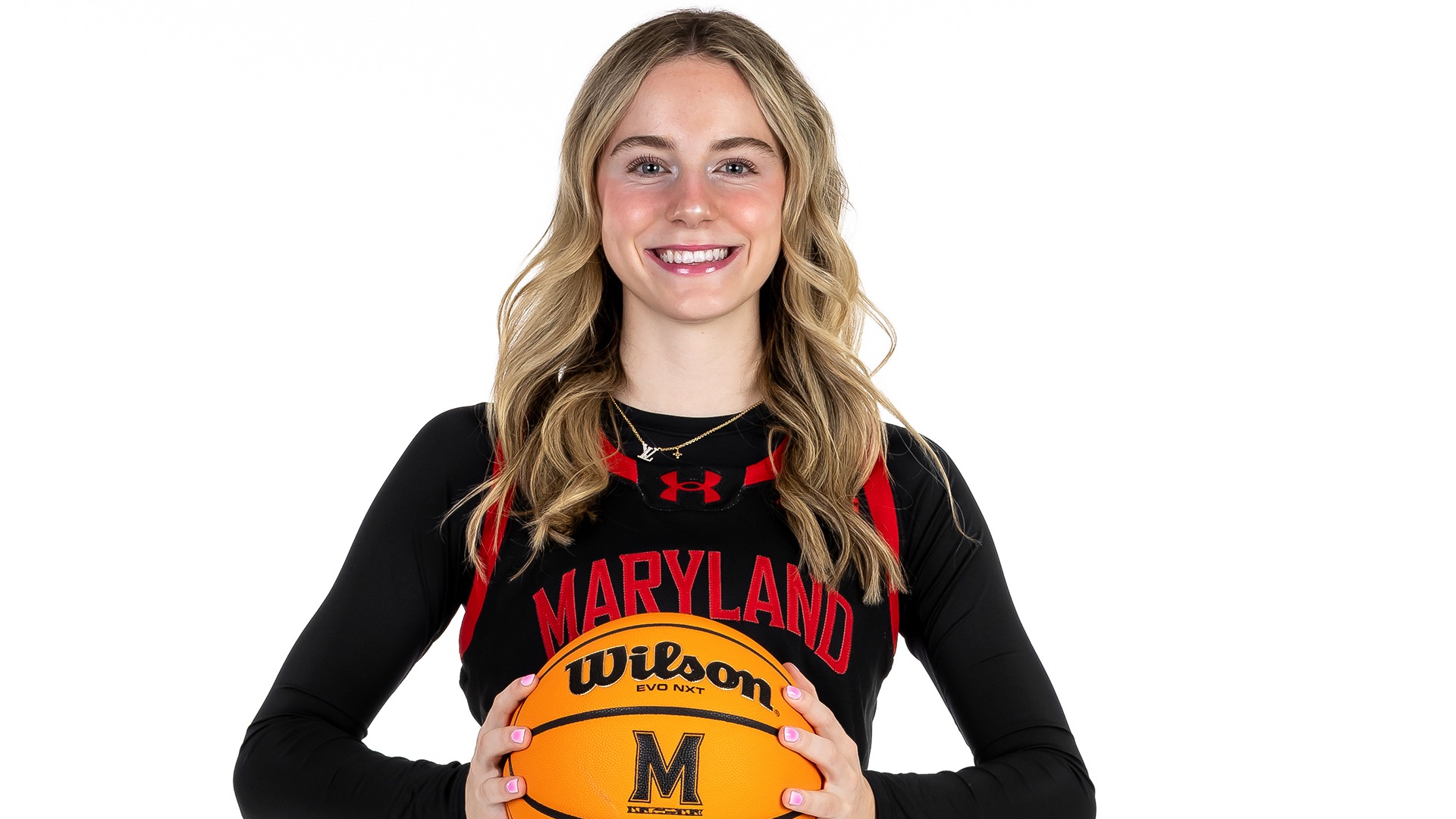 Addi Mack black uniform posed