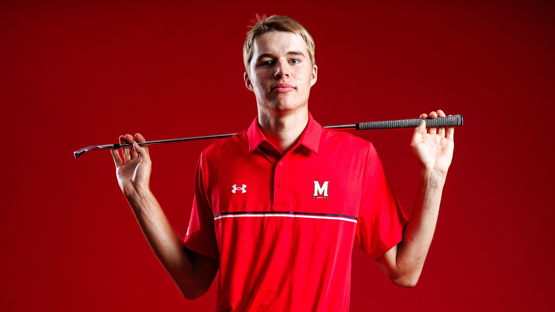 Emil Riegger red background 