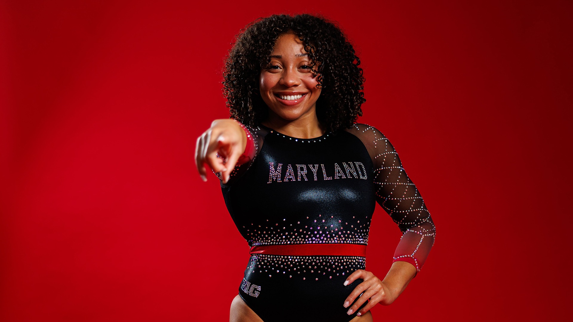 Logan Buckmon Posed Red Background