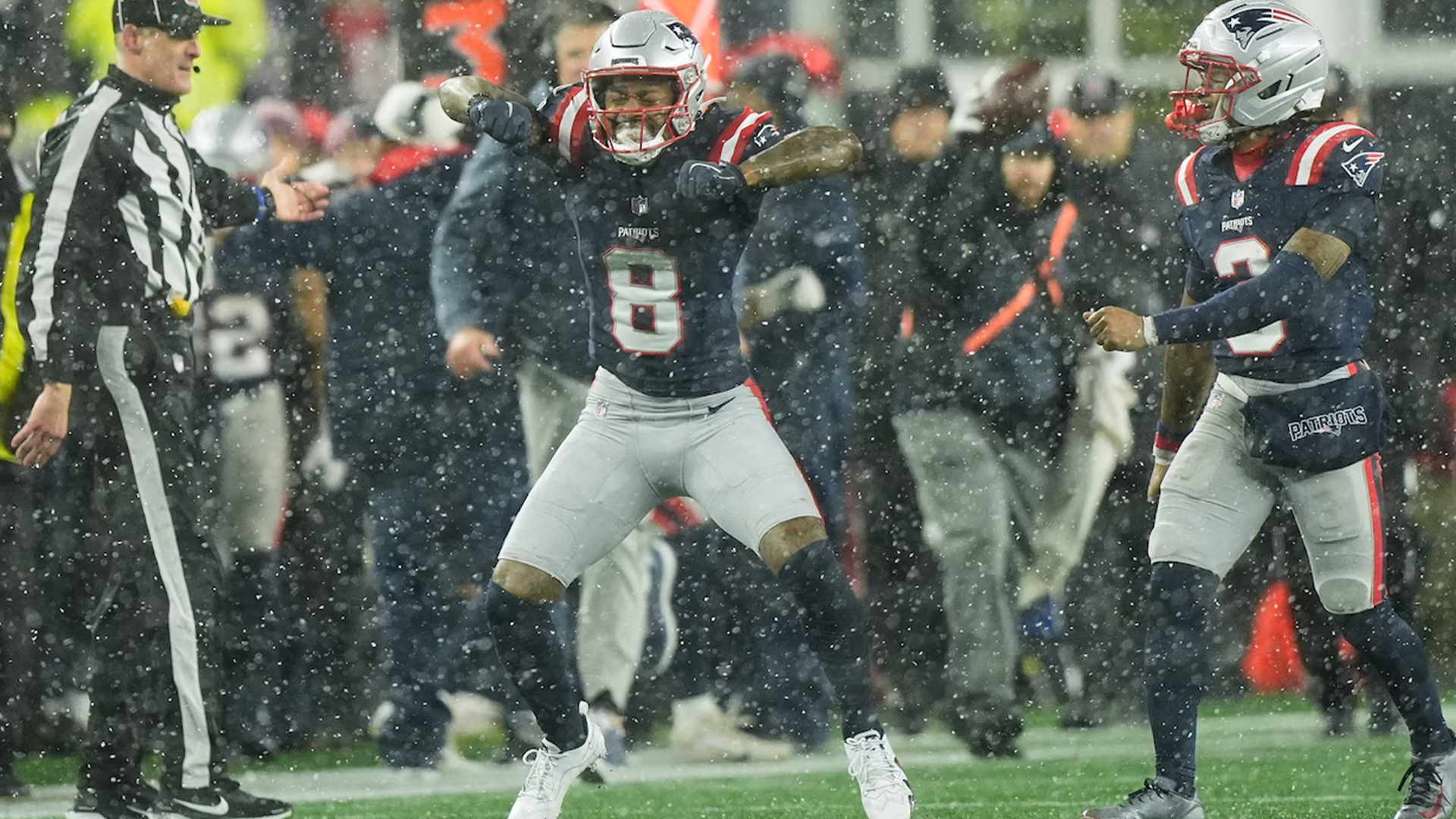 New England Patriots wide receiver Stefon Diggs (8) celebrates after a first down reception during the second half of an NFL divisional playoff football game against the Houston Texans