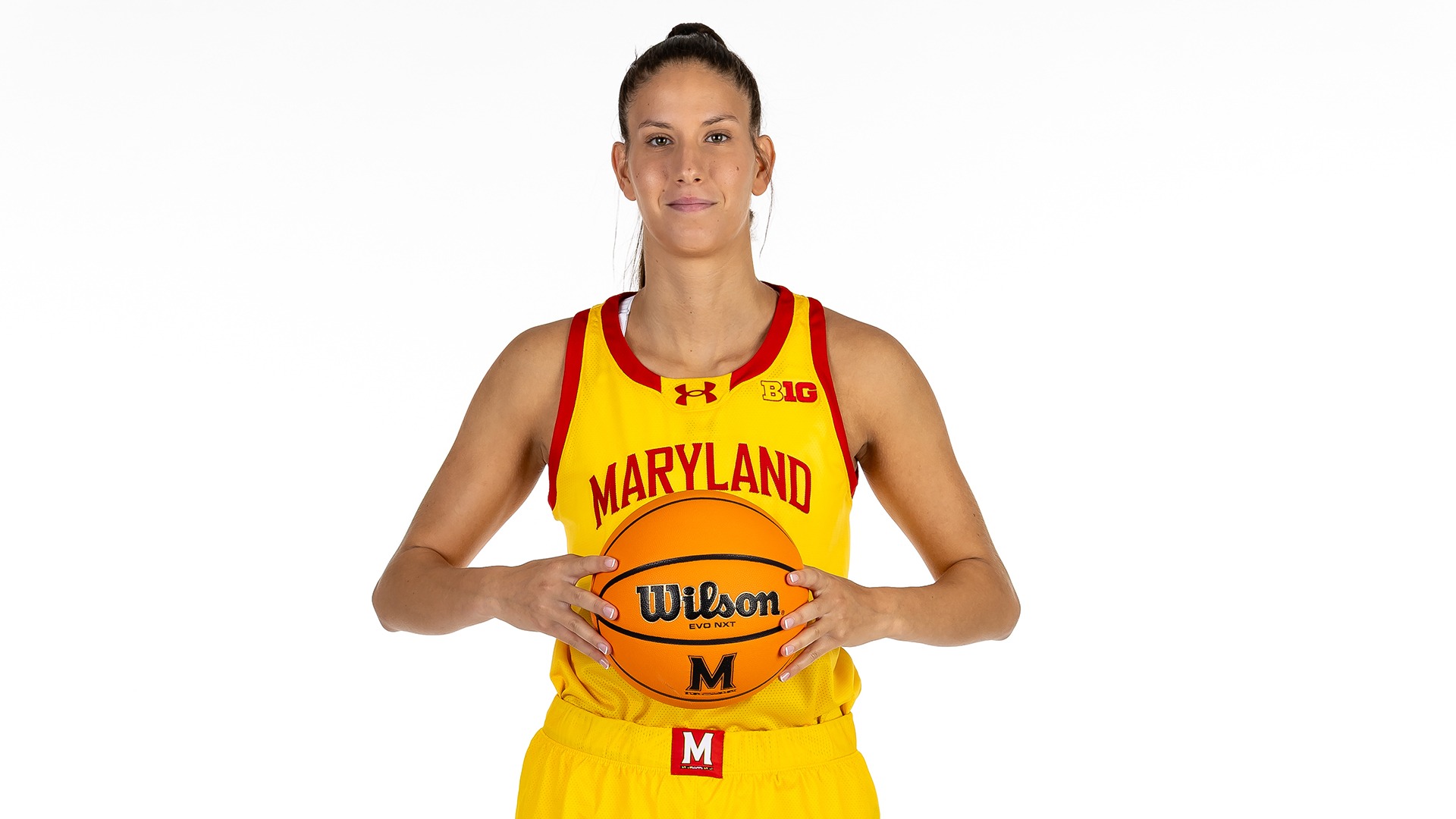 Yarden Garzon gold uniform posed