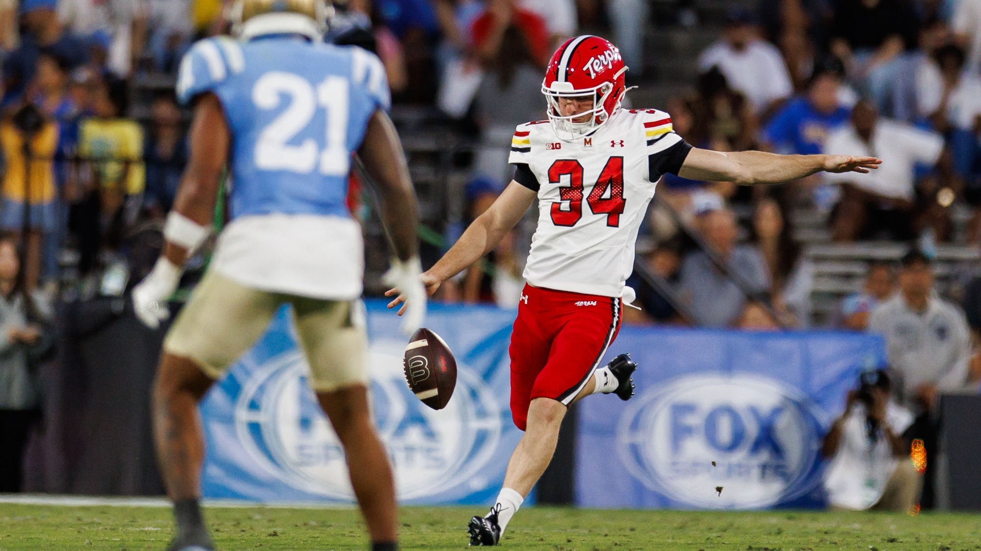 Bryce McFerson punting at UCLA during the 2025 season