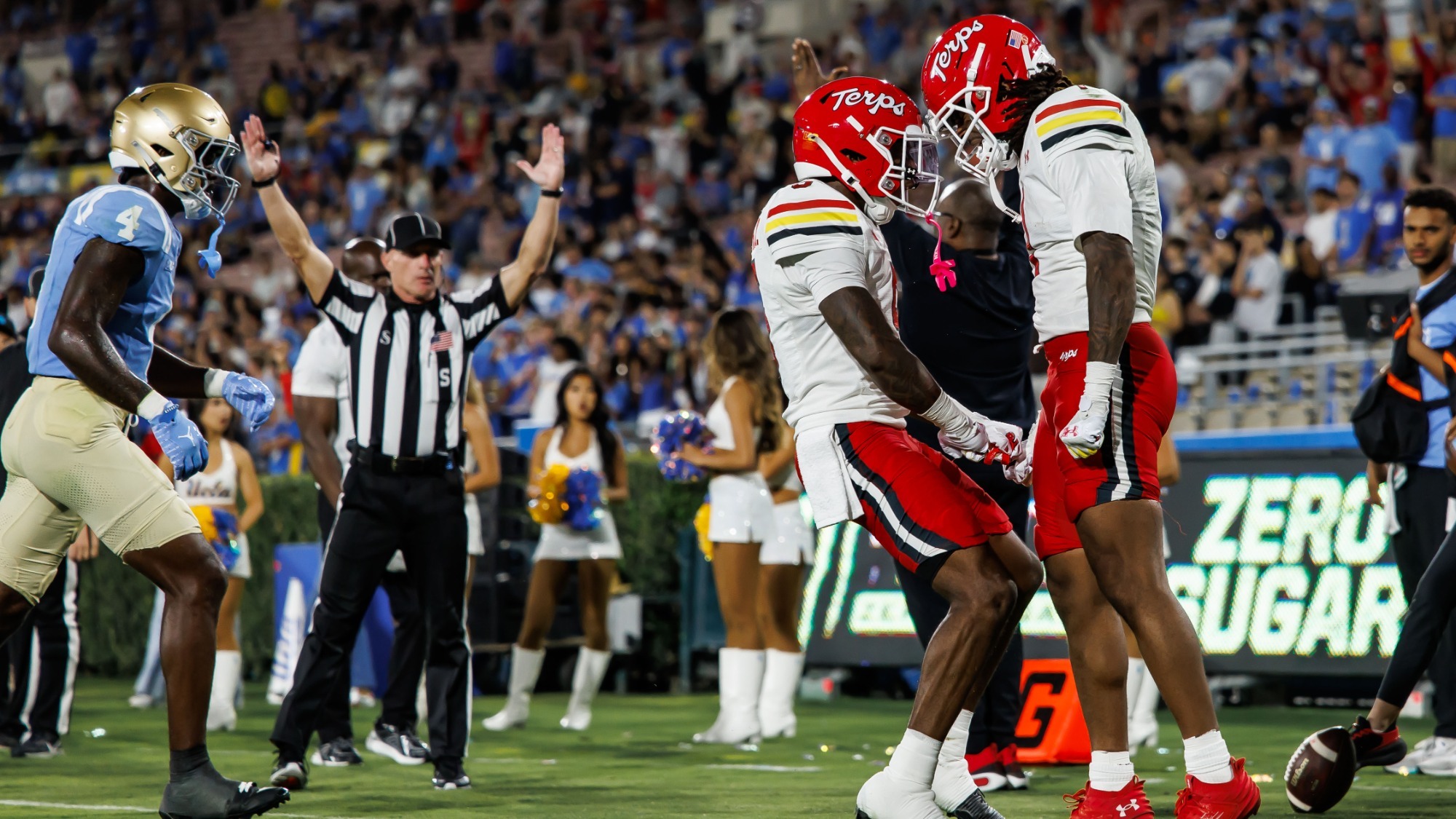 Jalil Farooq and Octavian Smith Jr. at UCLA during the 2025 season.