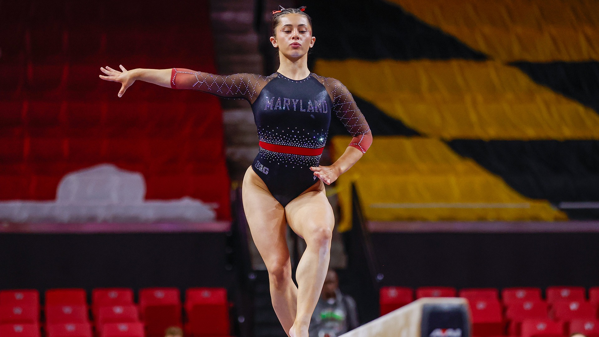 Maddie Komoroski on beam 