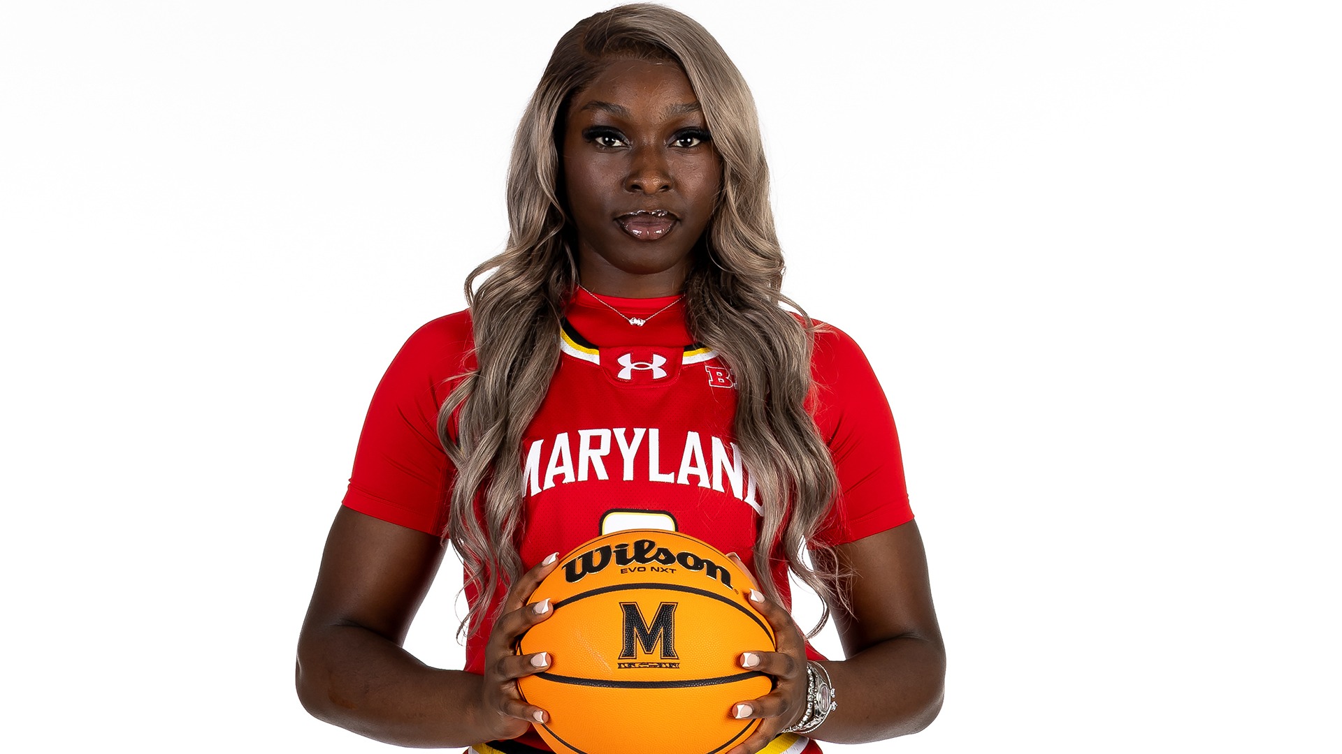 Isi ozzy-Momodu red uniform posed