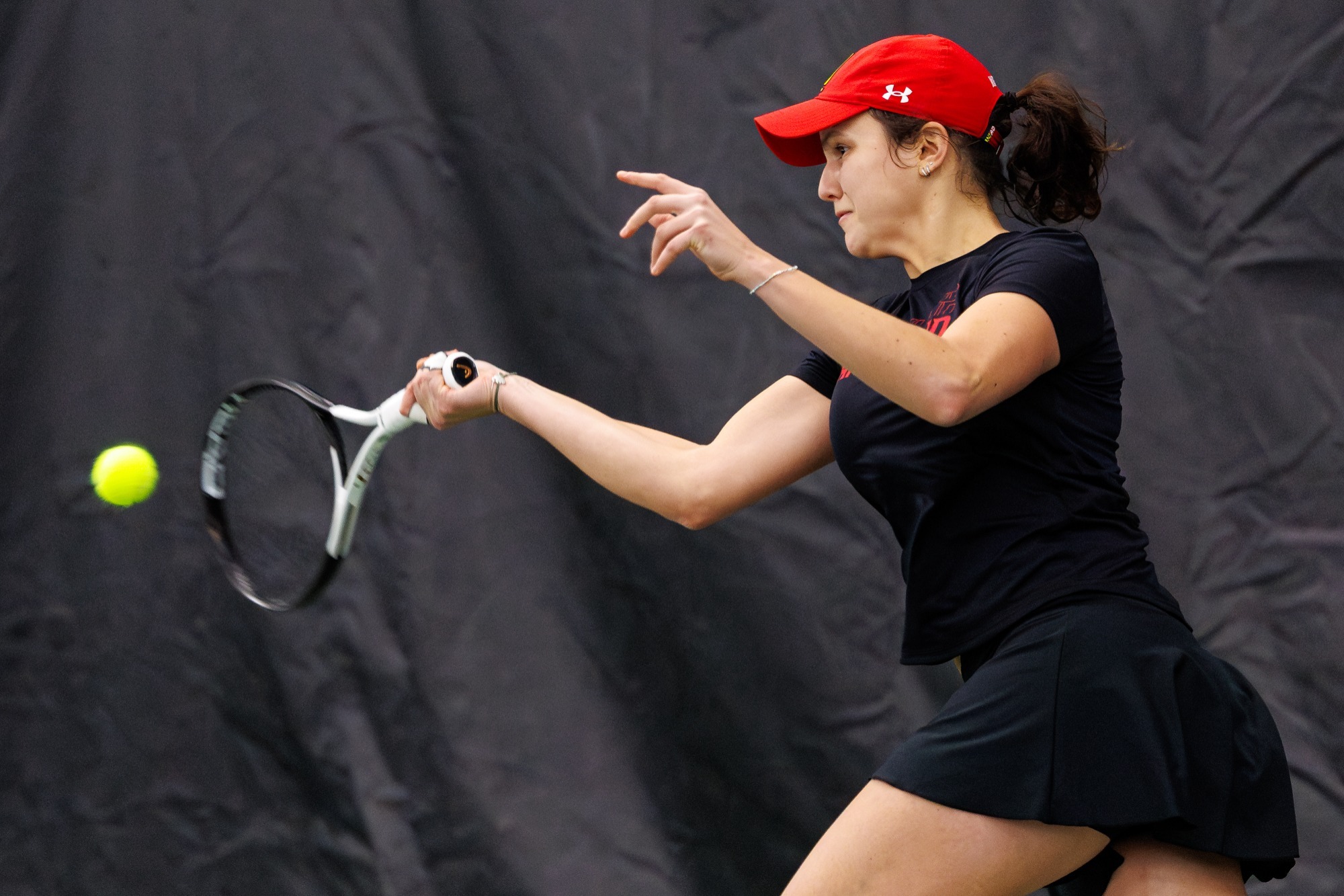 Emma Kovacevic strikes a ball against James Madison at the JTCC