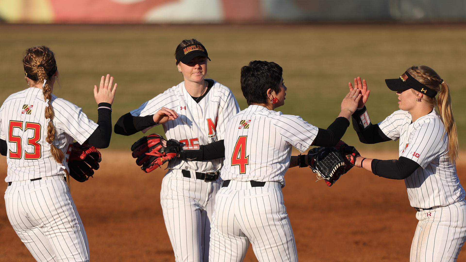 Maryland Celebrates a Defensive Play Against Syracuse