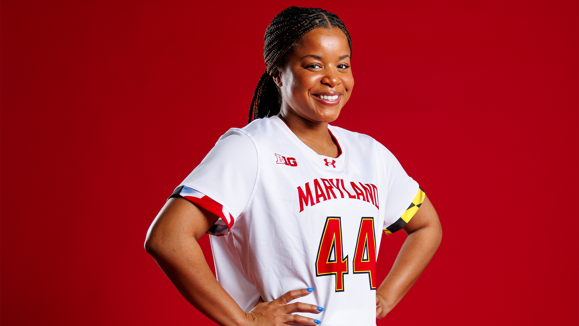 Kennedy Major posed red backdrop