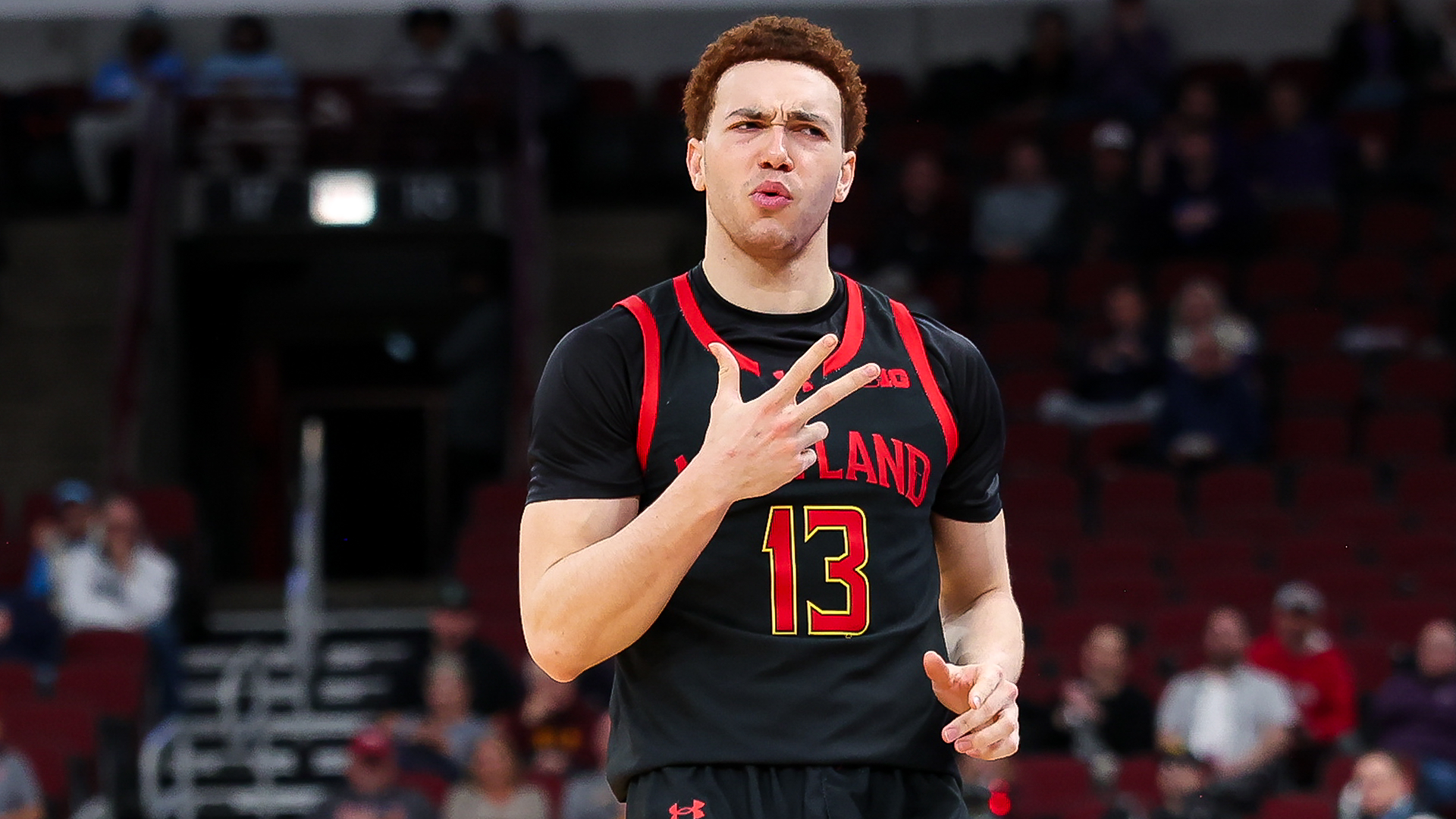 Elijah Saunders Celebrates a Three-Pointer Against Oregon