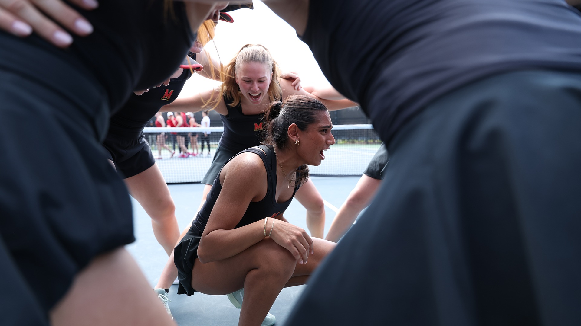Diya Challa hyping her teammates up in pregame huddle