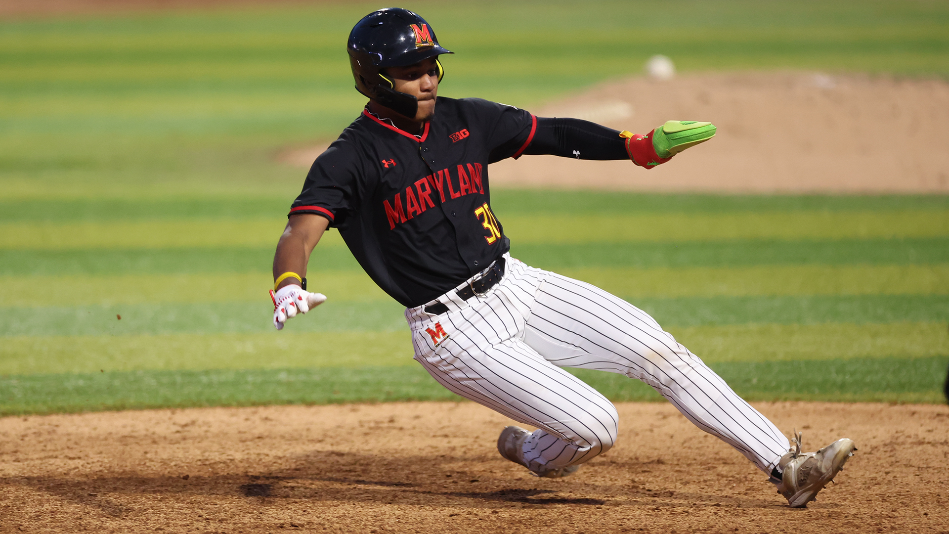 Paul Jones II Slides Into Second Base Against Virginia