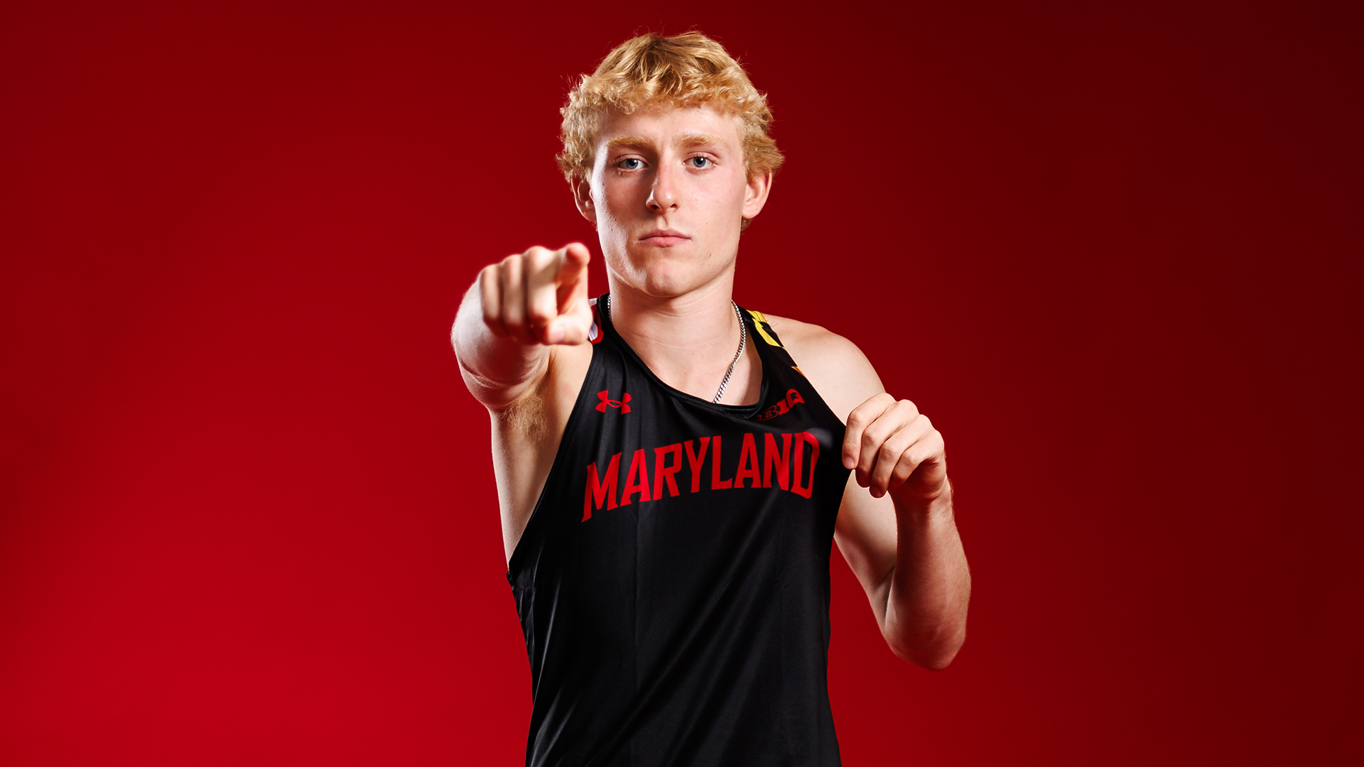Eric Penkala poses at track and field content day