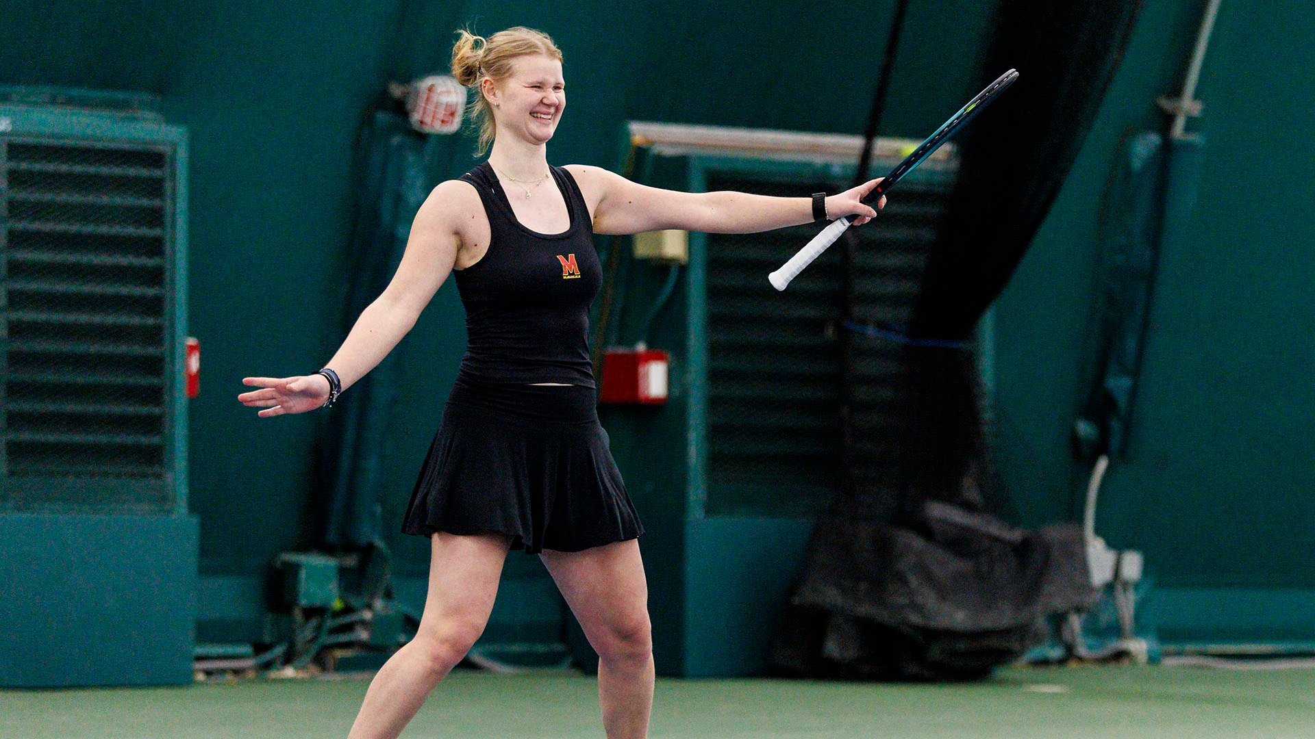 Oliwia Orlinska doing a dance after winning her hard-fought doubles match against UPenn