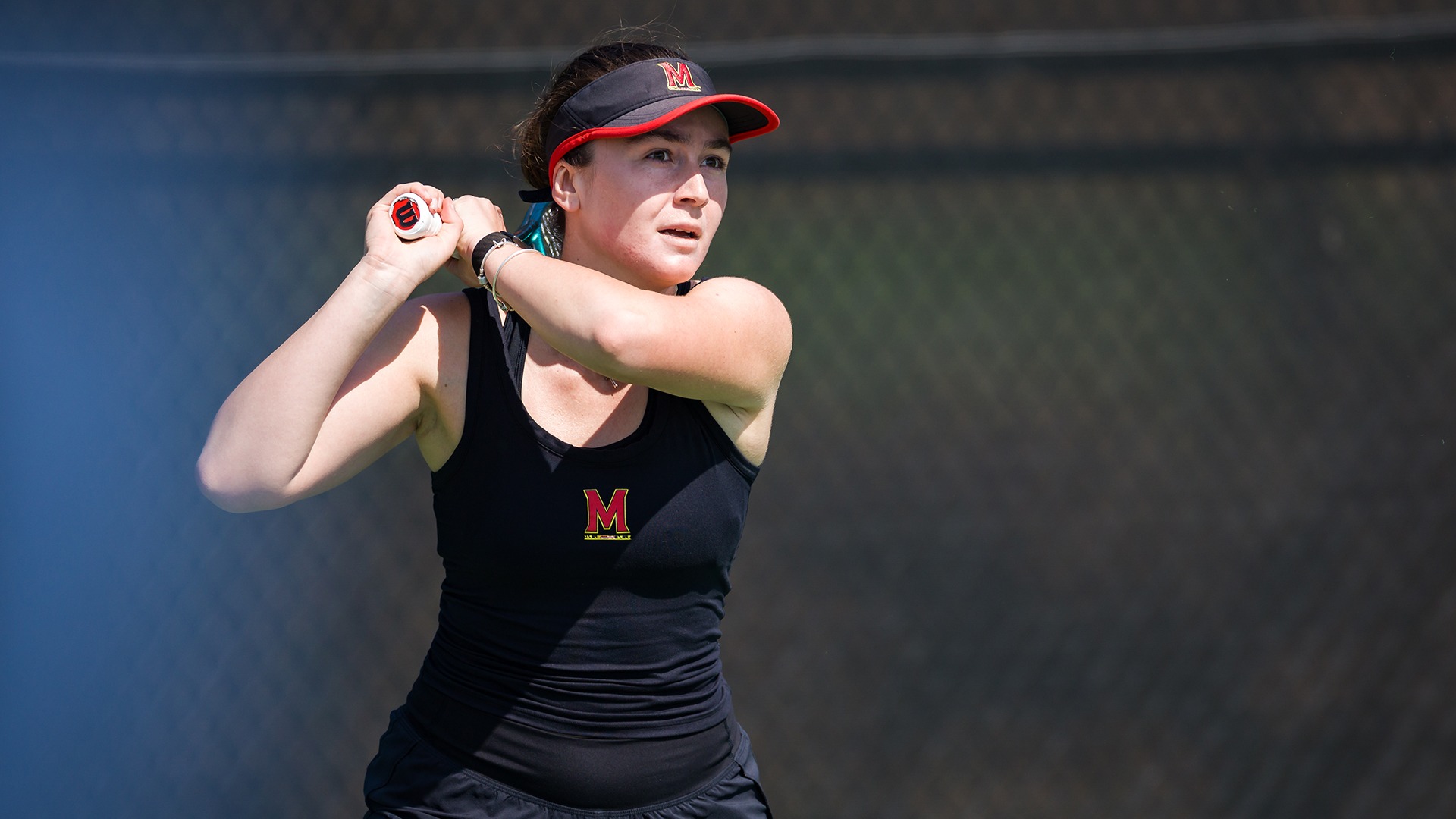 Tamari Gagoshidze Striking a Ball during Wisconsin Match