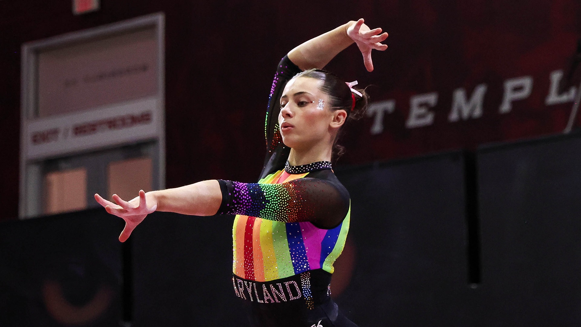 Maddie Komoroski Action Shot on beam at Temple 