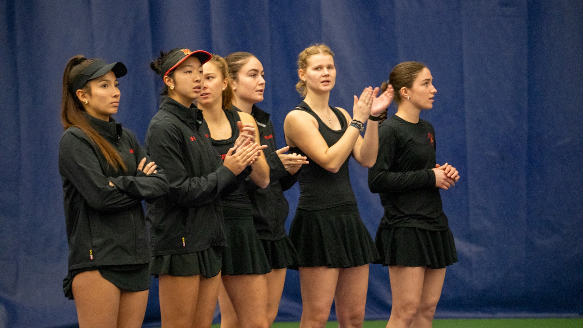 The Terps Tennis Team Cheering on the Girls at Washington