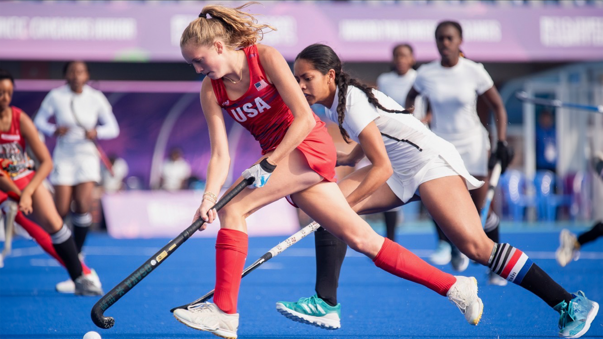 Ella Beach dribbling with the USA field hockey team