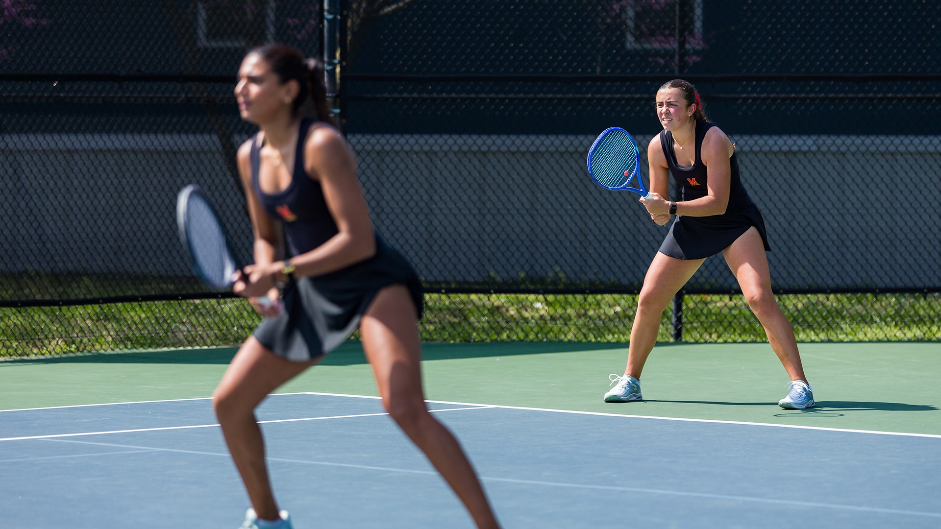 Diya Challa and Emma Ghirardato in a doubles match