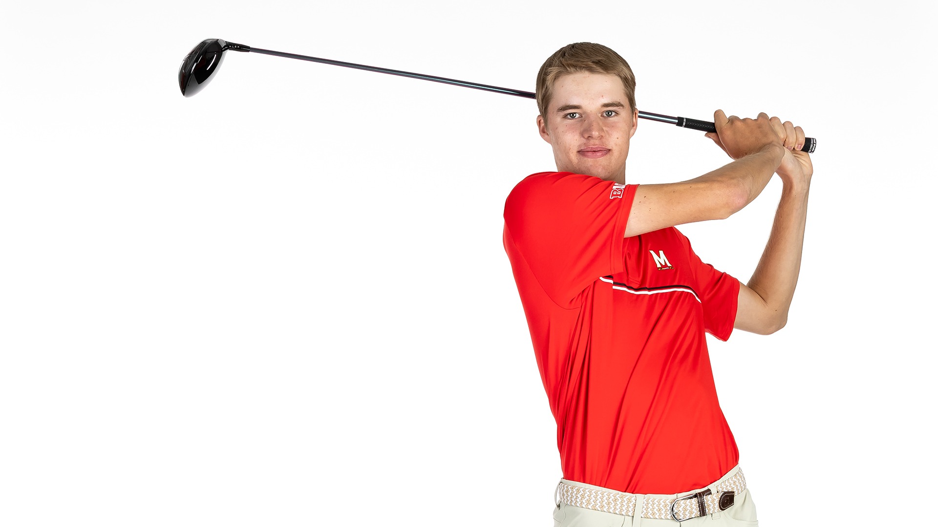 Emil Riegger posed with golf club