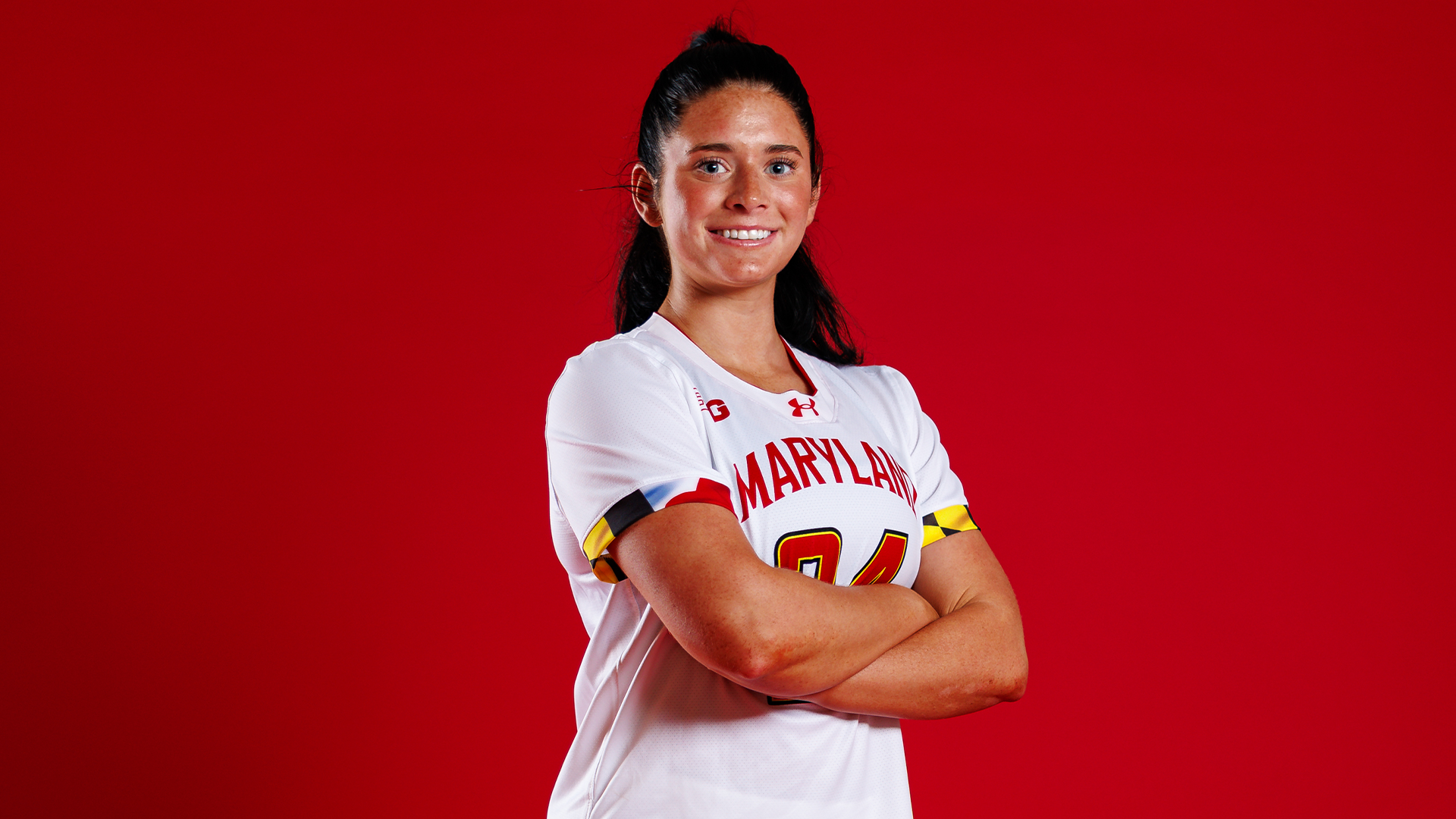 Mia Raucci posed red backdrop content day 