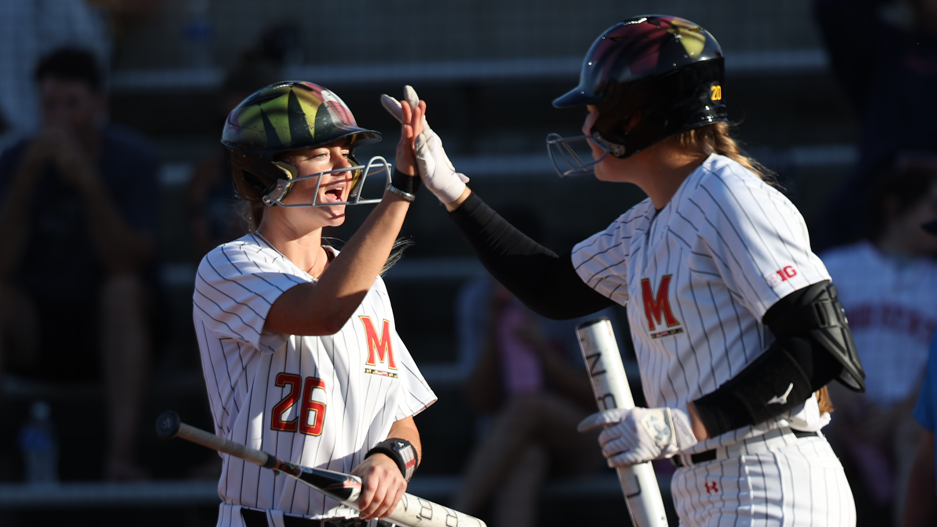 Sammi Woods Celebrates a Hit Against Illinois