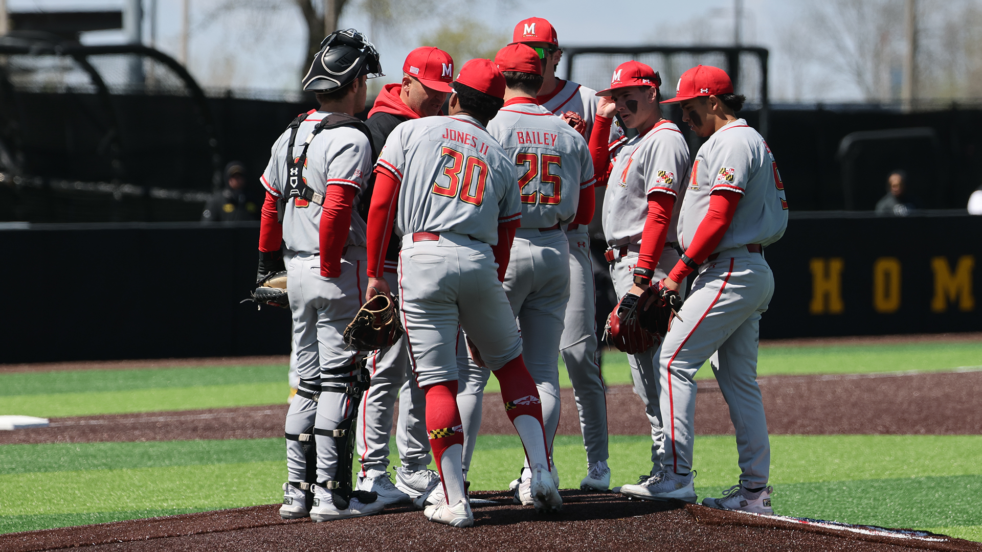 Maryland Meets On The Mound In A Game Against Iowa