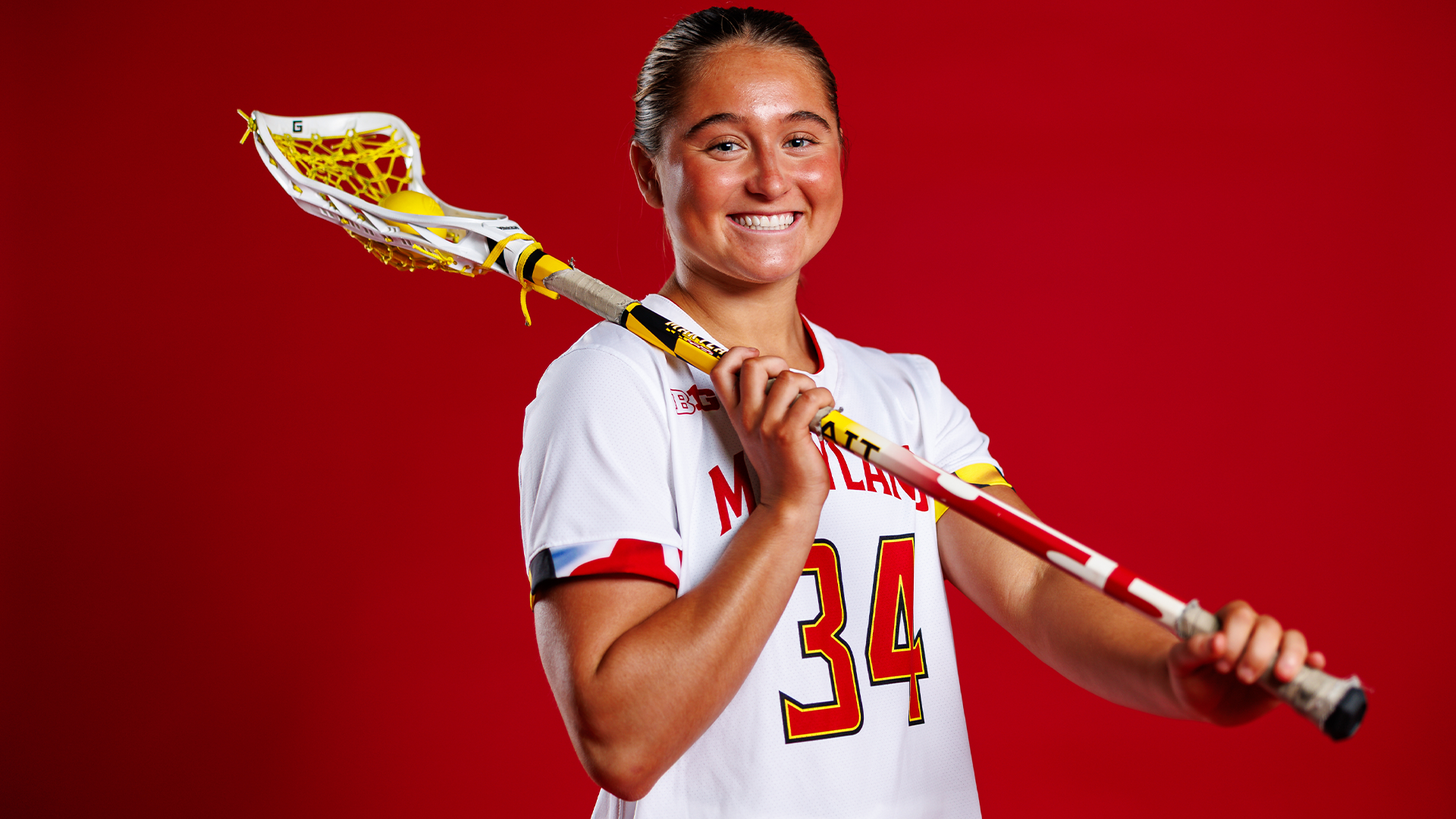 #34 Lyla Ingrilli posed red backdrop media day 