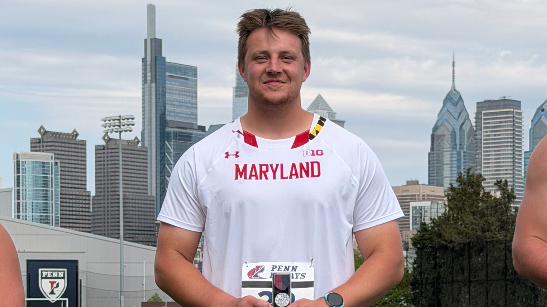 Rhys Allen poses on the podium at the Penn Relays