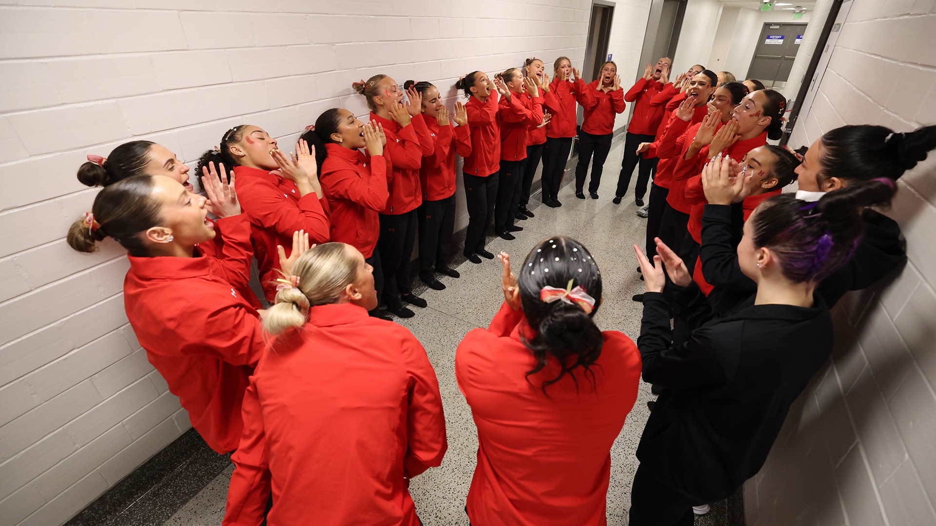 Gymnastics Team Huddle Shot Before NCAA Regionals 